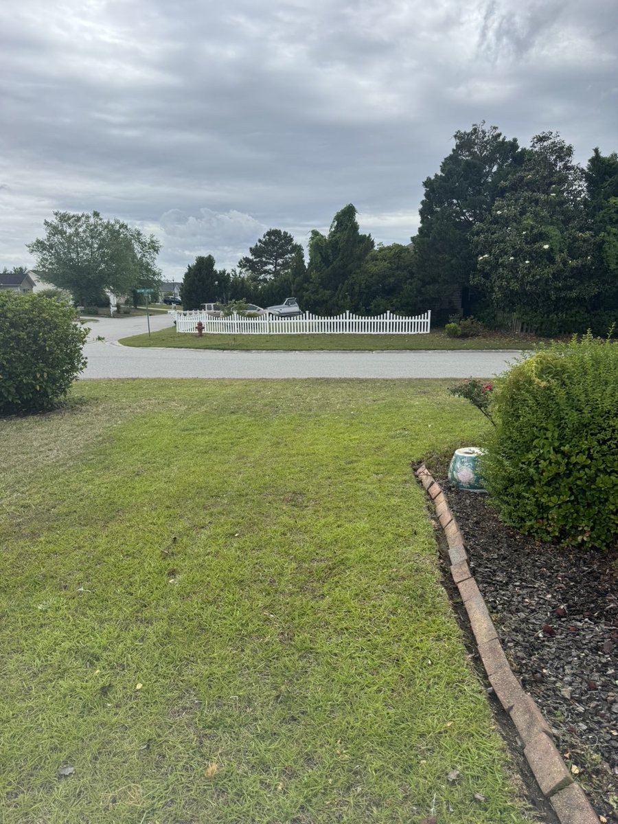 Same yard freshly mowed with clean edges — Castle Hayne NC